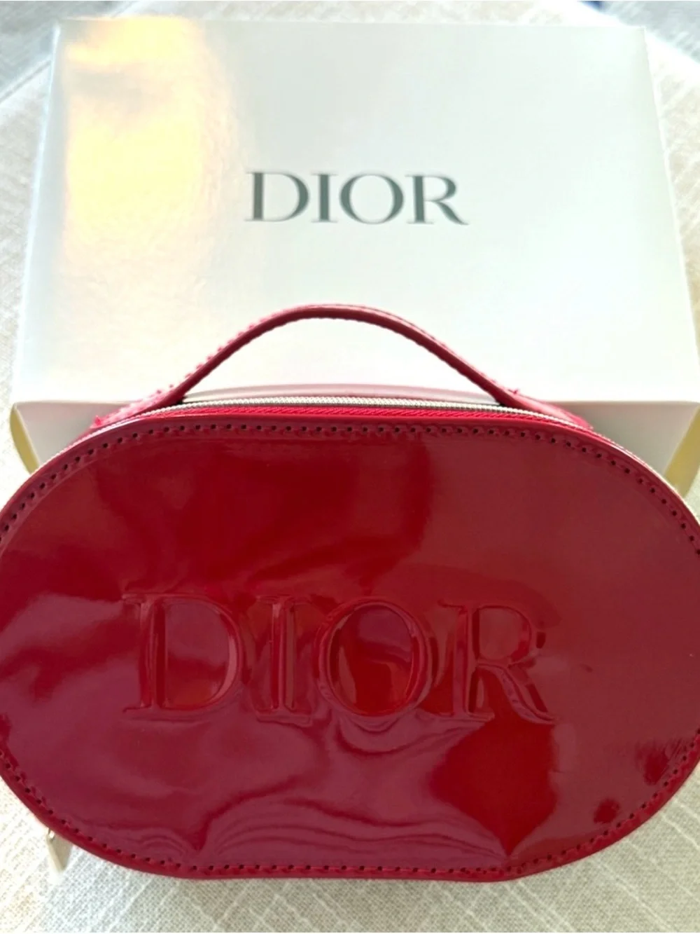 Dior Red Embossed Oval Top-Handle Cosmetic Case